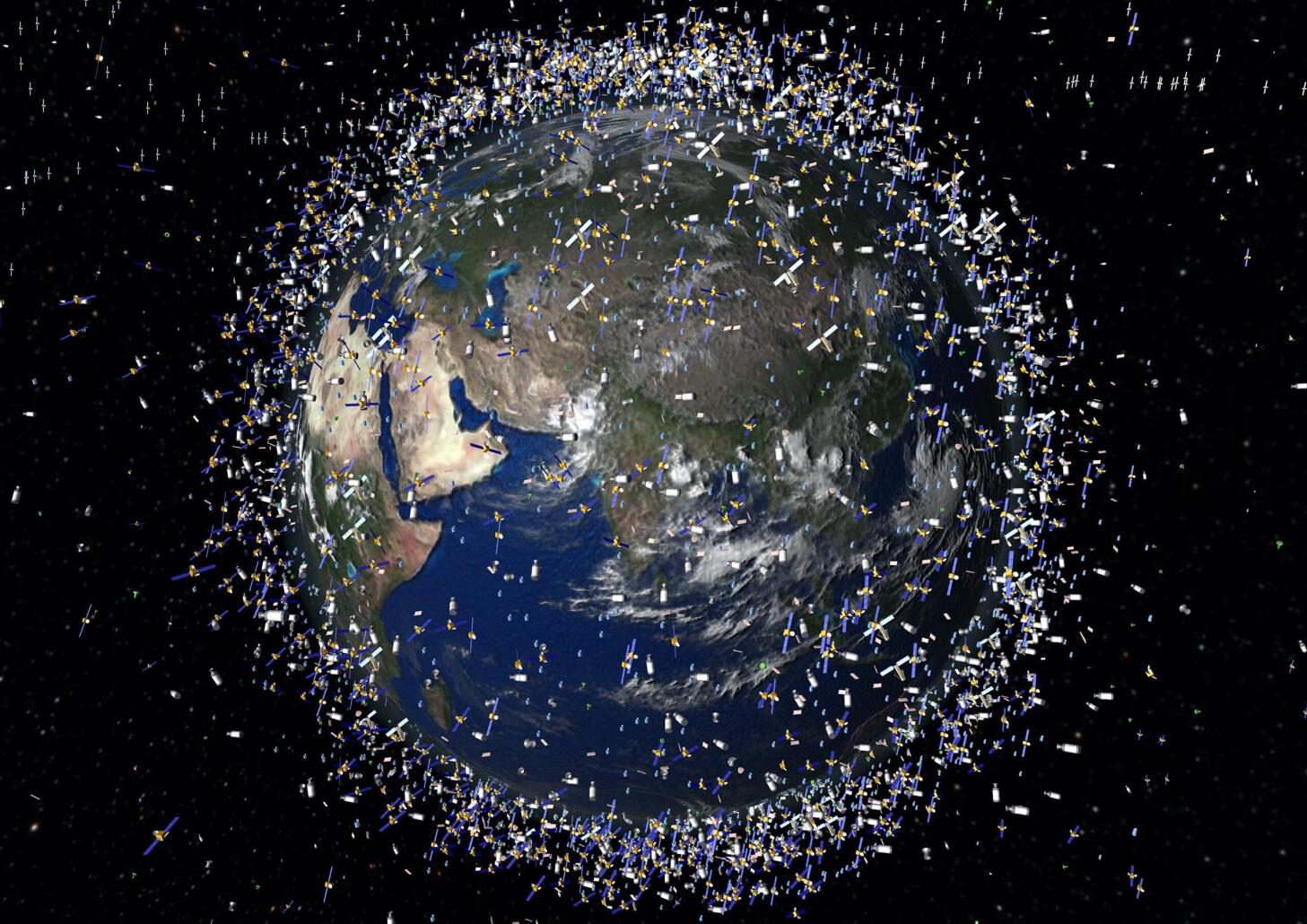 Un artiste crée par ordinateur cette image qui estime 12 000 objets en orbite autour de la Terre. Publié par l’Agence Spatiale Européenne (ESA) AFP PHOTO / ESA / HO